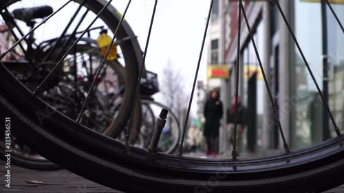 Bikes parking in Amsterdam.wheel close-up