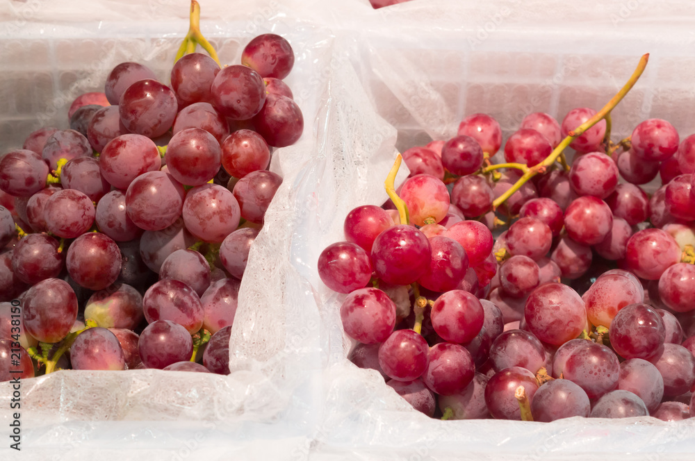 Ripe red grapes on sale in supermarket Ripe red grapes on sale in supermarket