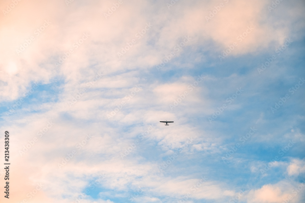Airplane flying over the blue sky. cloudy and sunset. Airplane flying over the blue sky. cloudy and sunset.