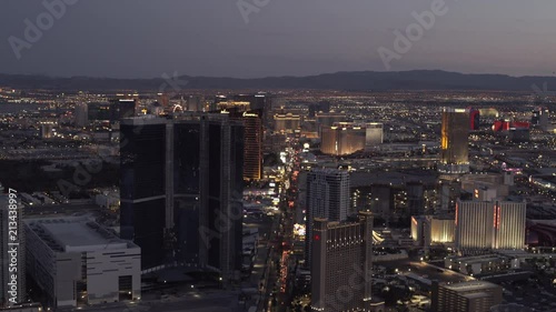 Overlook of Las Vegas strip from - dusk, night, handheld
