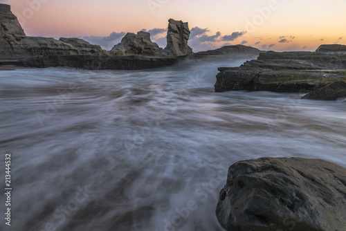 Klayar beach in long exposure shot and golden hours, East Java, Indonesia; May 2018