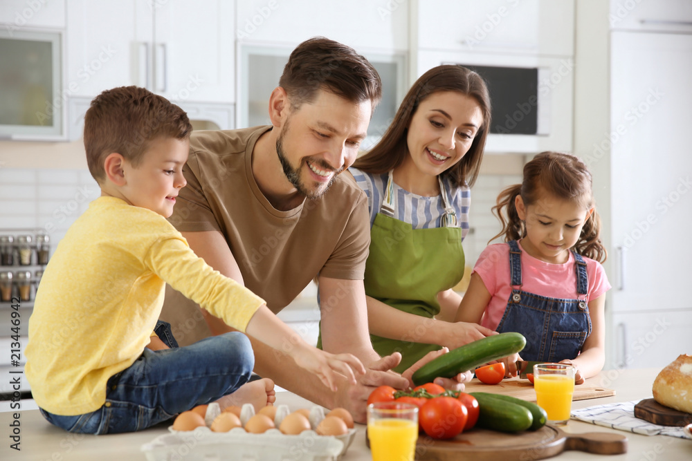 Happy family with children together in kitchen Happy family with children together in kitchen