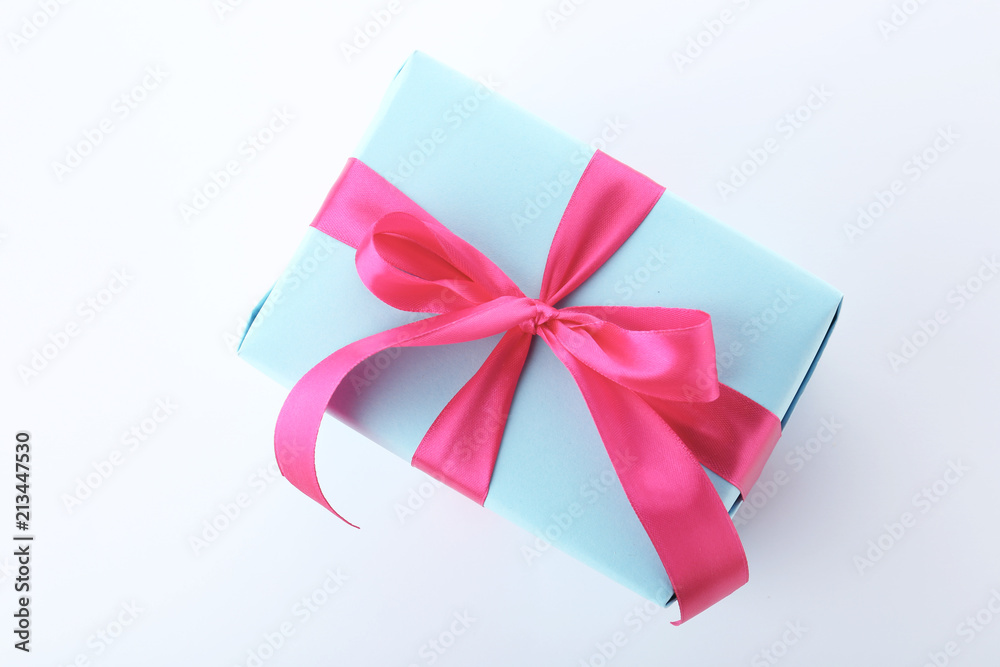 Beautiful gift box with ribbon on white background Beautiful gift box with ribbon on white background