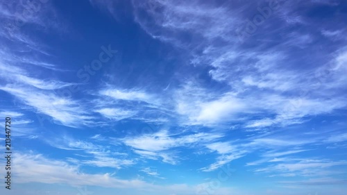 Peaceful backlit time lapse clouds