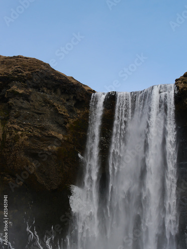 Skogafoss waterfall with rainbow  Iceland