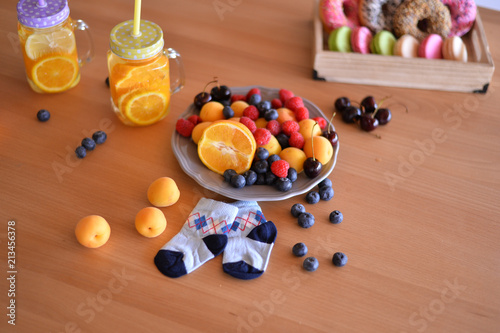 Healthy breakfast. A lot of berries. Apricot berry and donuts. A lot of food. European breakfast.   photo