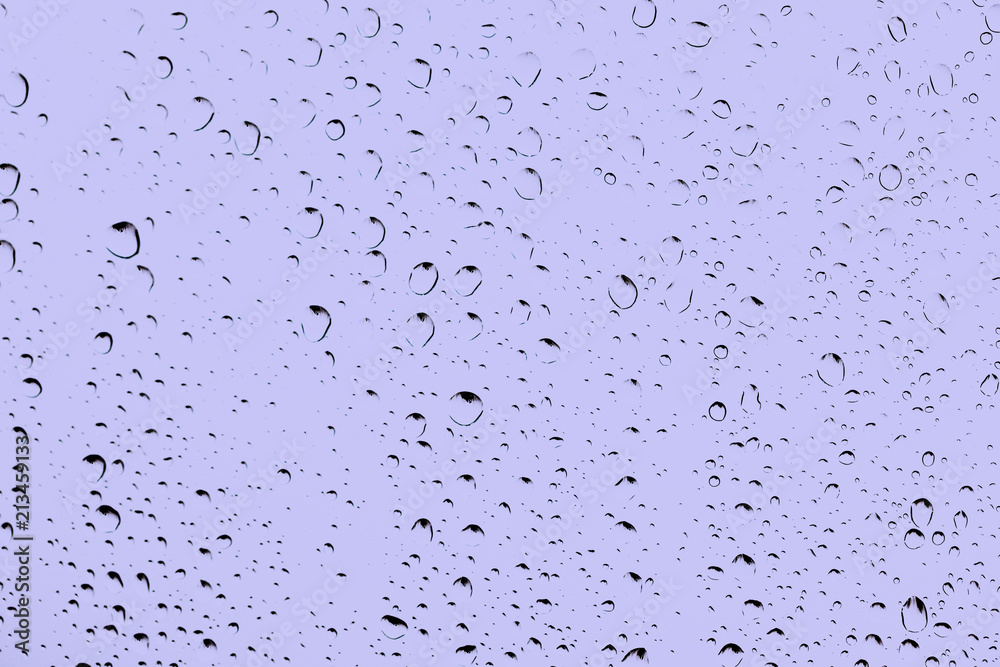 Water drops on glass white abstract background Water drops on glass white abstract background