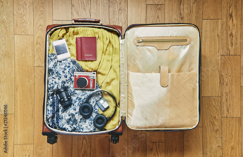 A suitcase for your holiday. The most necessary things. photo