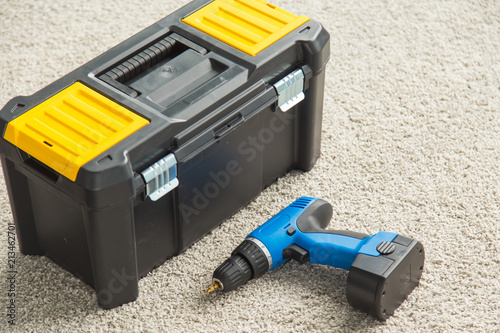 Closeup picture of toolbox and drill photo