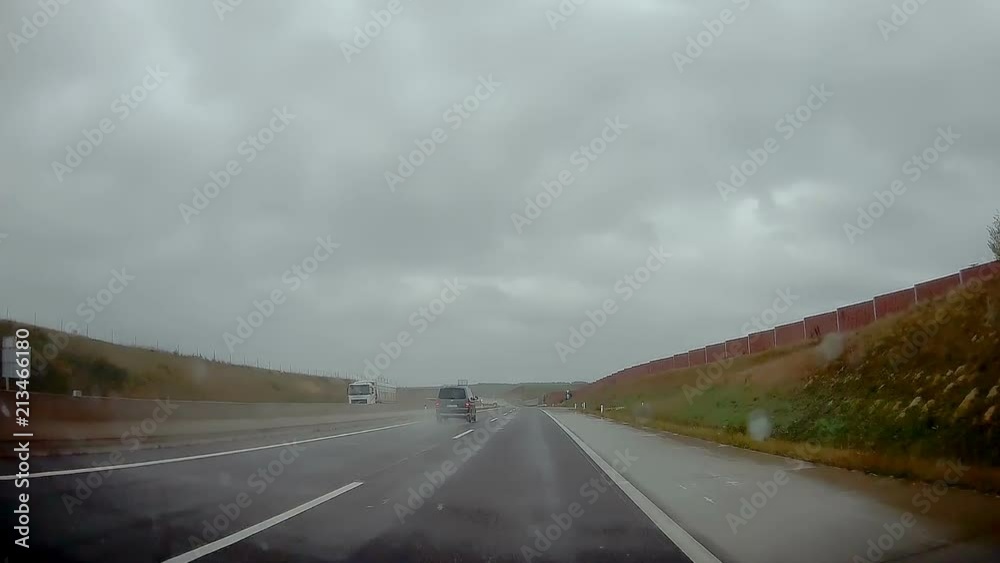 3060_Rainy_day_on_the_city_while_travelling_on_the_road.mov 3060_Rainy_day_on_the_city_while_travelling_on_the_road.mov