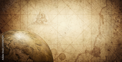Ancient old globe on the vintage map background. Selective focus. Retro style. Science, education, travel, vintage background. History and geography team. photo