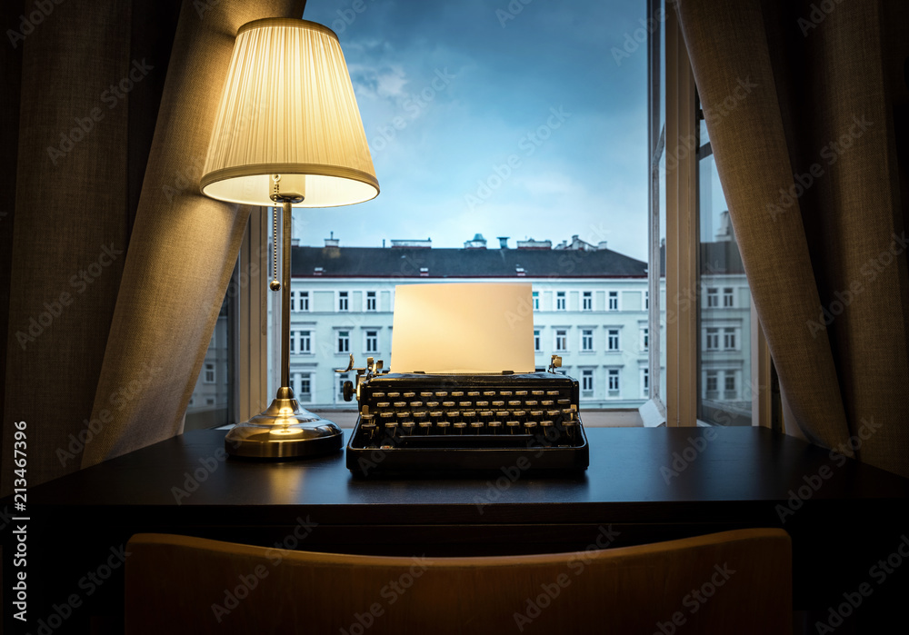 Workplace of a writer, journalist, creator. An old typewriter and a lamp on  the table. Retro style. The concept on scientific, historical, literature,  education and philosophical topics. Stock Photo | Adobe Stock