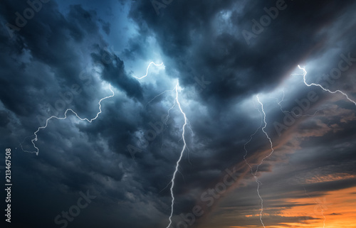 Fototapeta Lightning thunderstorm flash over the night sky