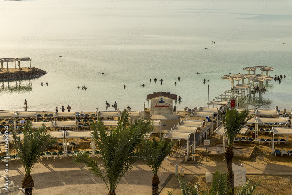 Fototapeta premium People bathing in the dead sea