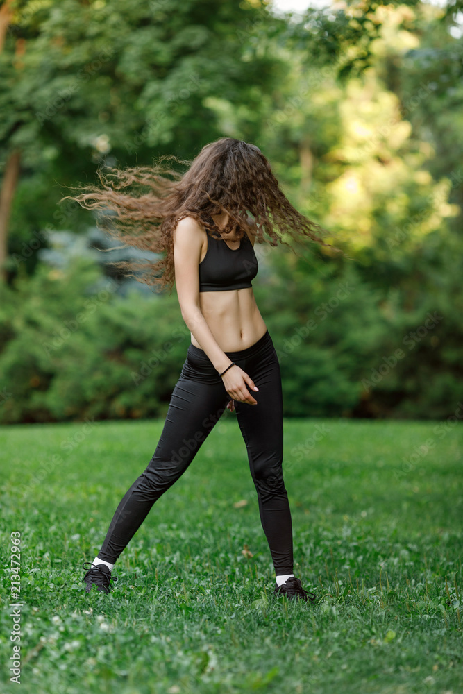 woman doing exercises warming up woman doing exercises warming up