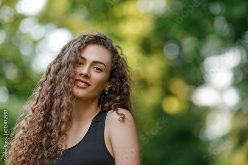 curly beautiful smiling woman