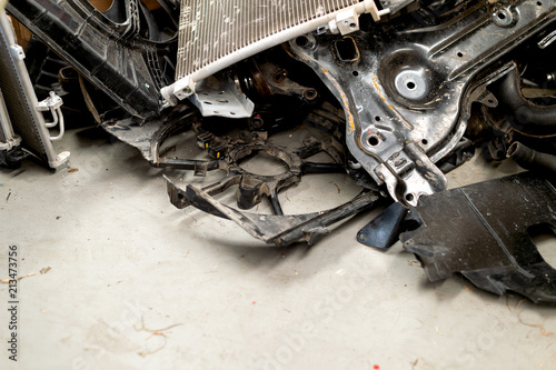 old machine, autopart and car radiator in the garage. top view  photo