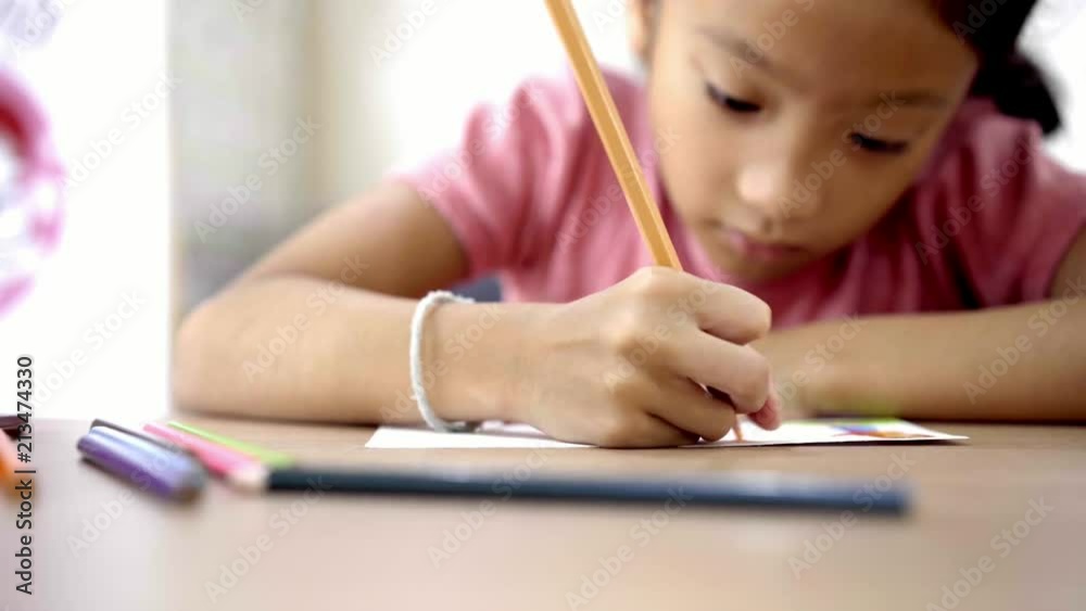 Little girl enjoy drawing and painting on paper Little girl enjoy drawing and painting on paper