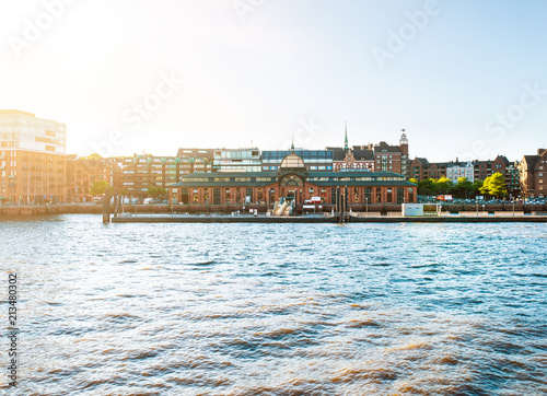 Hamburg Elbe river waterfront with historic fish market hall on sunny summer evening photo