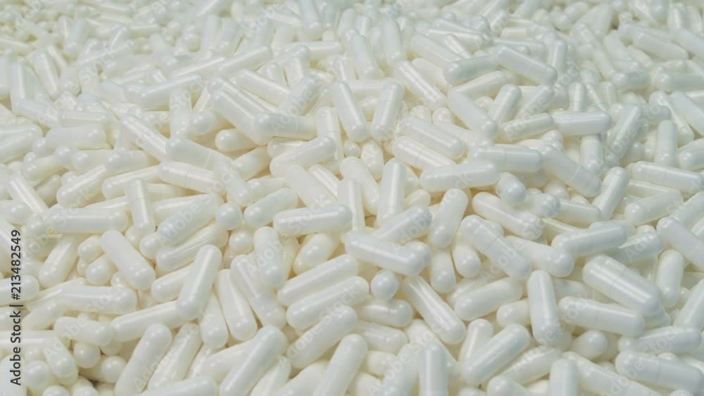 Medical Capsules Pour Into Pile
