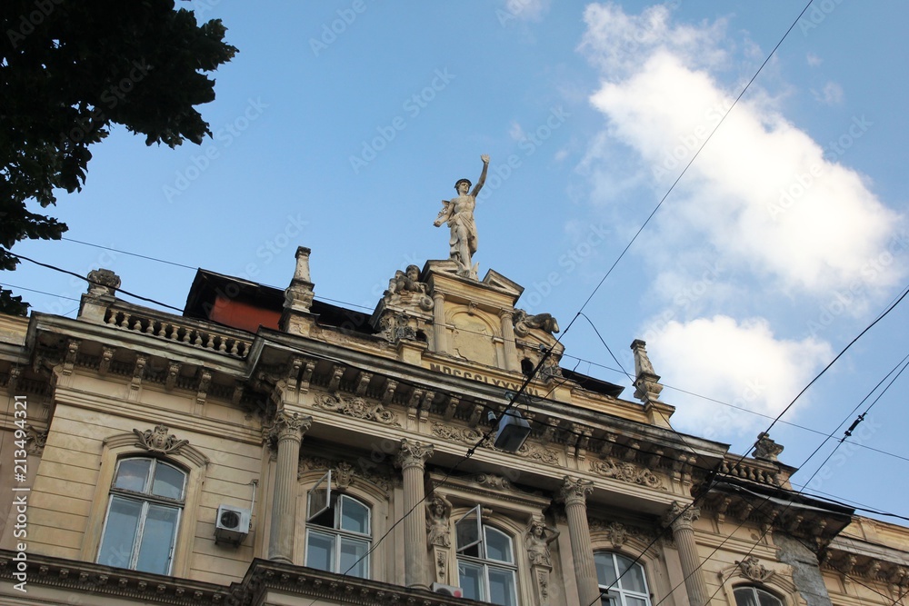 The Mercury sculpture on the old tenement house in Lviv, Ukraine
