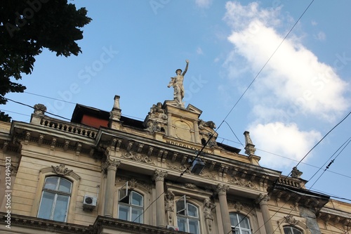 The Mercury sculpture on the old tenement house in Lviv, Ukraine © SylwiaMoz