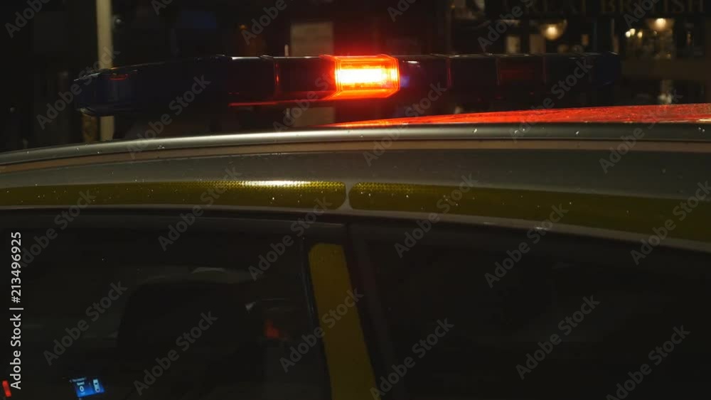 Red Siren Flasher On The Police Car. London at night. Red Siren Flasher On The Police Car. London at night.