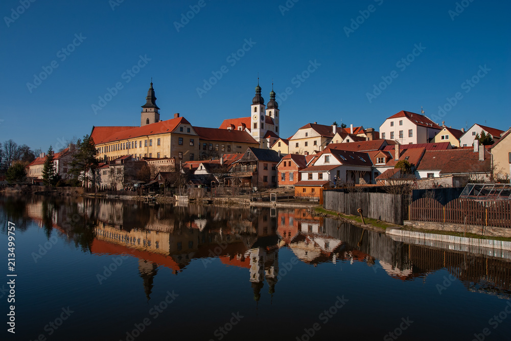Telc city sight reflected in the lake - Telc castle. UNESCO World Heritage Site. Renaissance castle Telc in Czech Republic.