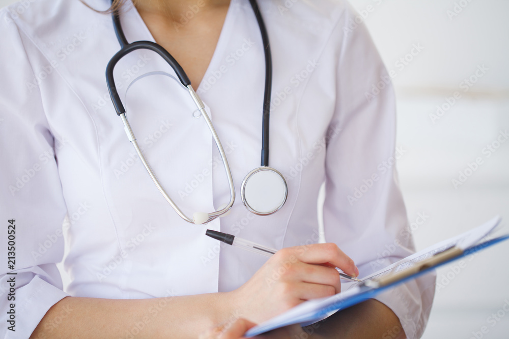 Doctor Woman With Stethoscope In Hospital. Concept Of The Global Healthcare And Medicine