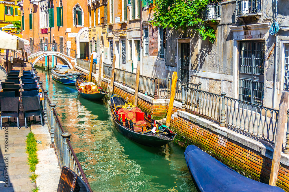 Gondolas Parked Along Canal in Venice, Italy