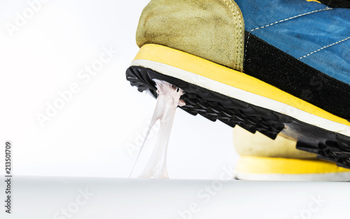 Simulation scenario of chewing gum on the floor, Stick with sneakers.