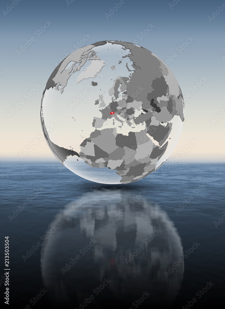 Switzerland on translucent globe above water Switzerland on translucent globe above water