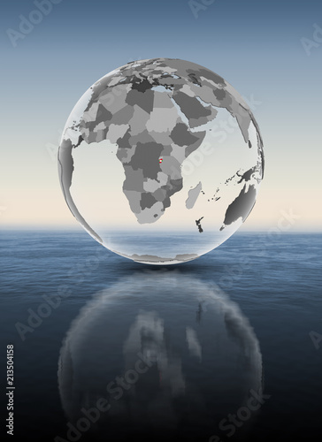 Fototapeta Naklejka Na Ścianę i Meble -  Burundi on translucent globe above water