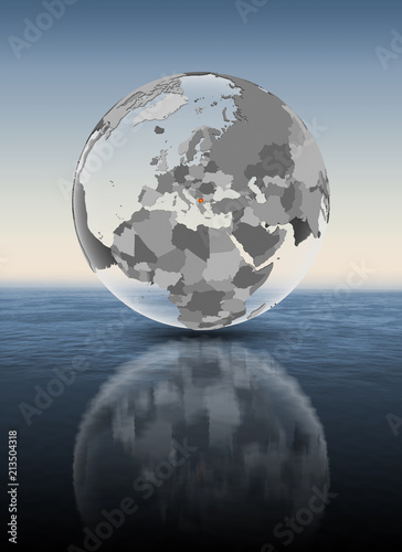 Macedonia on translucent globe above water