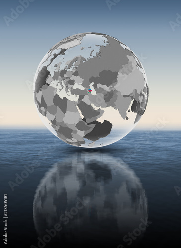 Azerbaijan on translucent globe above water