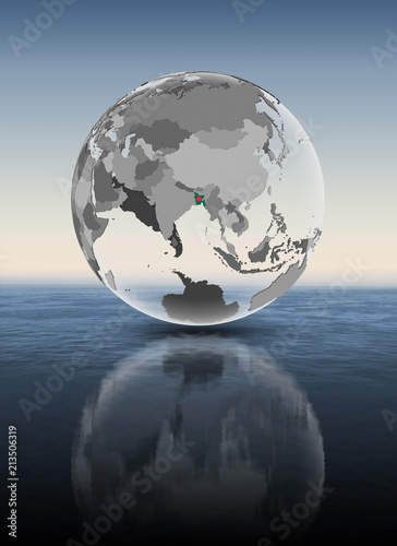 Fototapeta Naklejka Na Ścianę i Meble -  Bangladesh on translucent globe above water