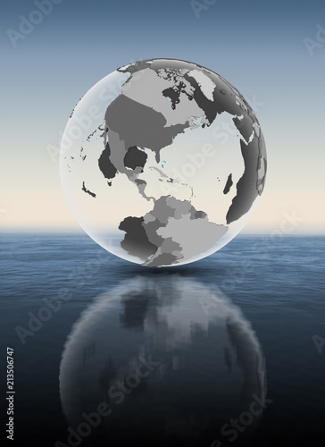 Bahamas on translucent globe above water