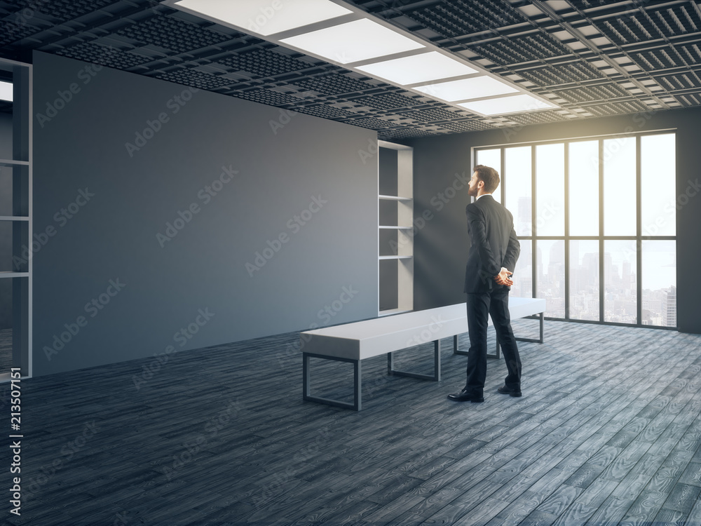 Fototapeta premium businessman in modern gallery hall