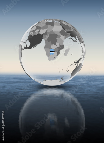 Fototapeta Naklejka Na Ścianę i Meble -  Botswana on translucent globe above water