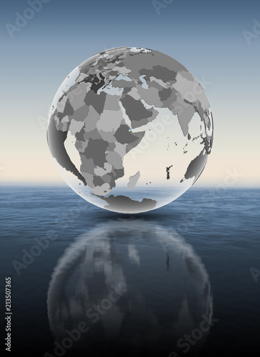 Fototapeta Naklejka Na Ścianę i Meble -  Djibouti on translucent globe above water