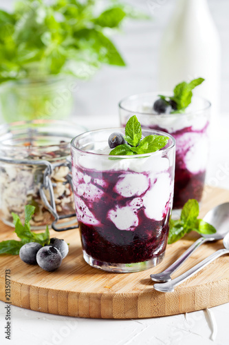 Glasses Of Homemade Yogurt With Crushed Blueberries