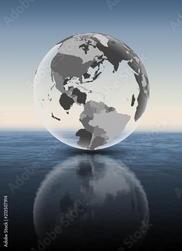 Haiti on translucent globe above water