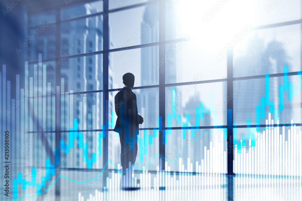 Stock trading candlestick chart and diagrams on blurred office center background. Stock trading candlestick chart and diagrams on blurred office center background.