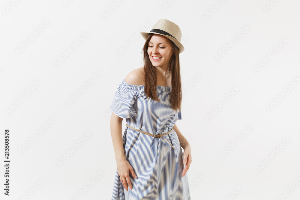 Young tender elegant charming woman dressed blue dress, cute hat with long brunette hair posing isolated on white background. People, sincere emotions, lifestyle concept. Advertising area. Copy space. Young tender elegant charming woman dressed blue dress, cute hat with long brunette hair posing isolated on white background. People, sincere emotions, lifestyle concept. Advertising area. Copy space.