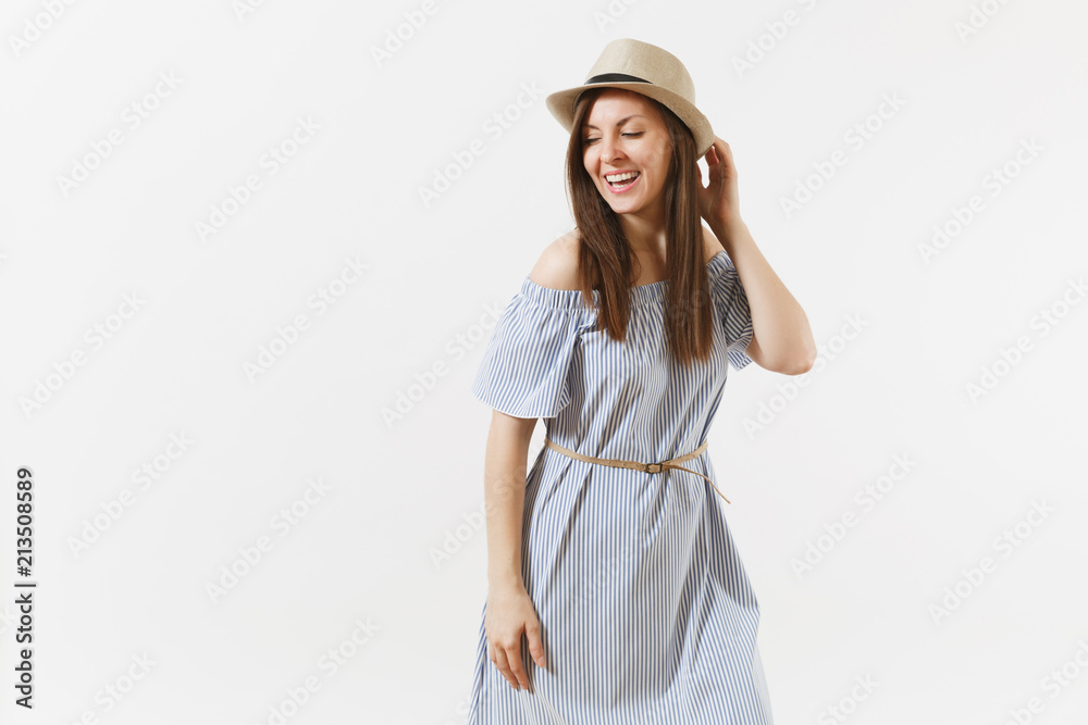 Young tender elegant charming woman dressed blue dress, cute hat with long brunette hair posing isolated on white background. People, sincere emotions, lifestyle concept. Advertising area. Copy space. Young tender elegant charming woman dressed blue dress, cute hat with long brunette hair posing isolated on white background. People, sincere emotions, lifestyle concept. Advertising area. Copy space.