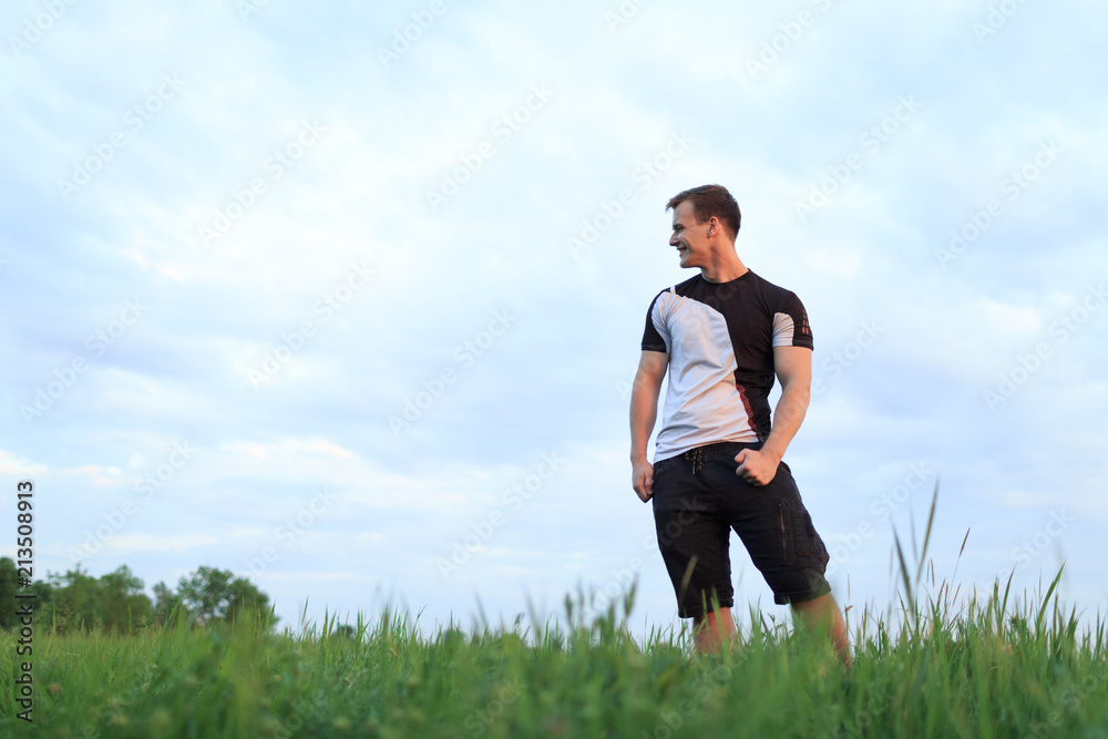 Young man against the sky