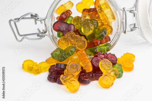 gummy candy in the shape of bicyles in a glass jar photo