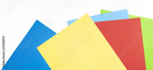 Colourful paper sheets on white background