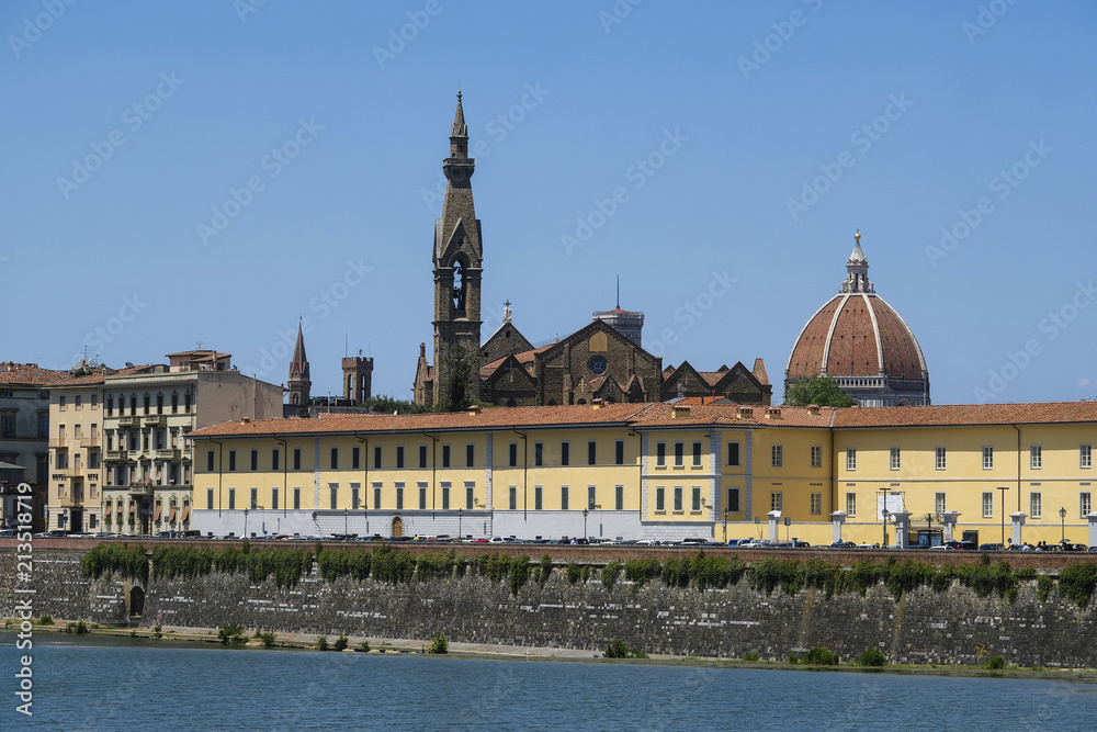 Florence, Italy - June, 2, 2018: embankment of Arno river in Florence