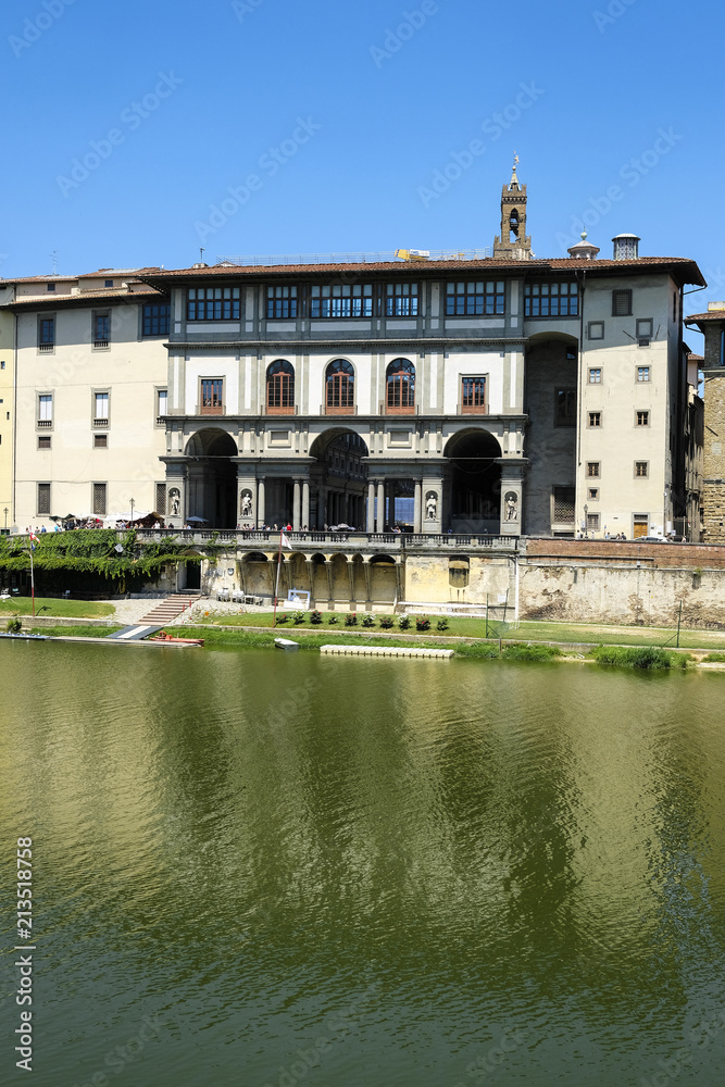 Florence, Italy - June, 2, 2018: embankment of Arno river in Florence with Uffizi gallery